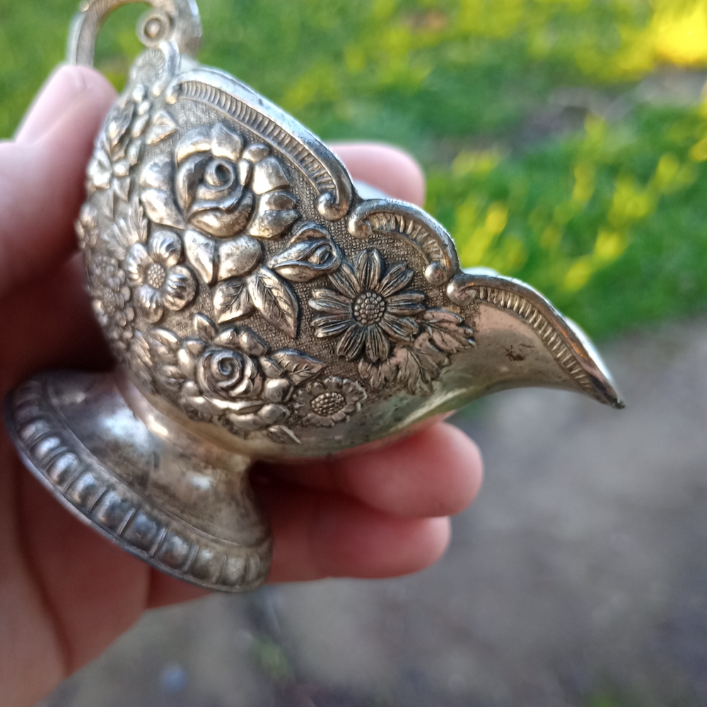 Ornate Silver Creamer with Floral Design